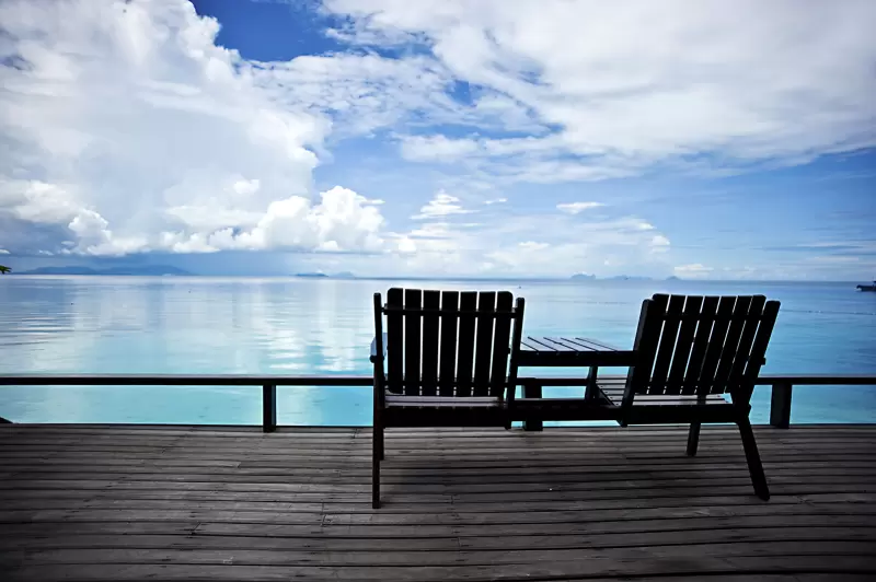 Chairs by beautiful ocean