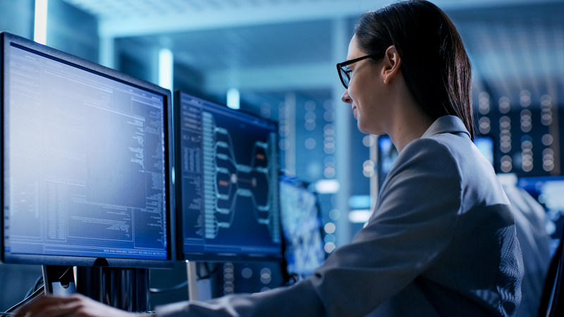 Close-up Shot of Female IT Engineer Working in Monitoring Room