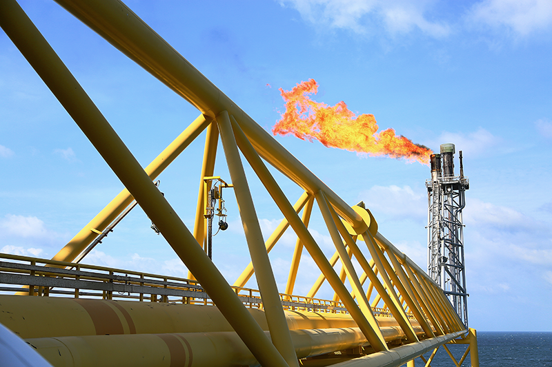 Offshore oil and gas construction platform with flare
