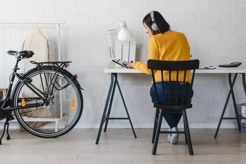woman working in home office with laptop computer